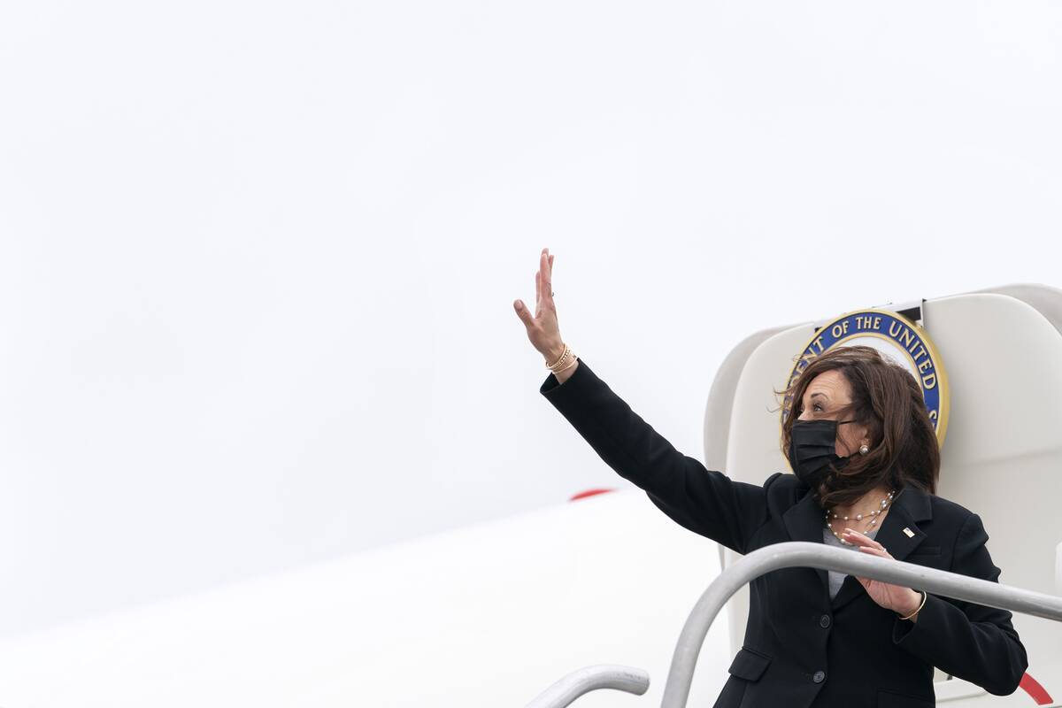 Vice President Harris waves as she boards Air Force Two in Oakland, Calif., on Monday, April 5, 2021. (Jacquelyn Martin/AP Photo)