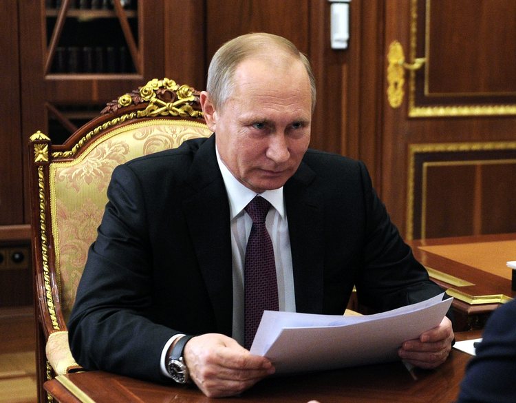 Russian President Vladimir Putin celebrates Trump's victory this morning in the Kremlin. (Sputnik)</p>  