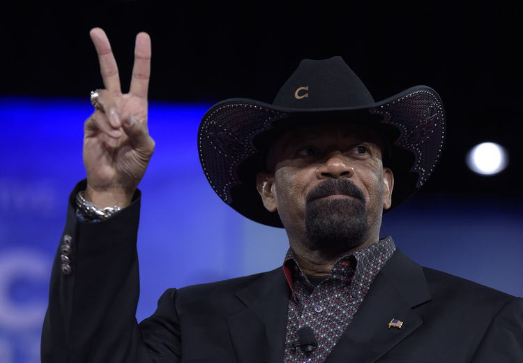 Milwaukee County Sheriff David Clarke gestures as he speaks at CPAC.&nbsp;(AP/Susan Walsh)</p>  