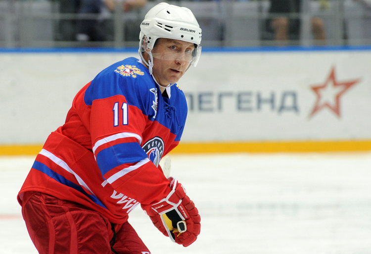 Vladimir Putin takes part in a hockey game&nbsp;in Sochi&nbsp;last month.&nbsp;(Mikhail Klimentyev/Sputnik/Kremlin&nbsp;via Reuters)</p>  