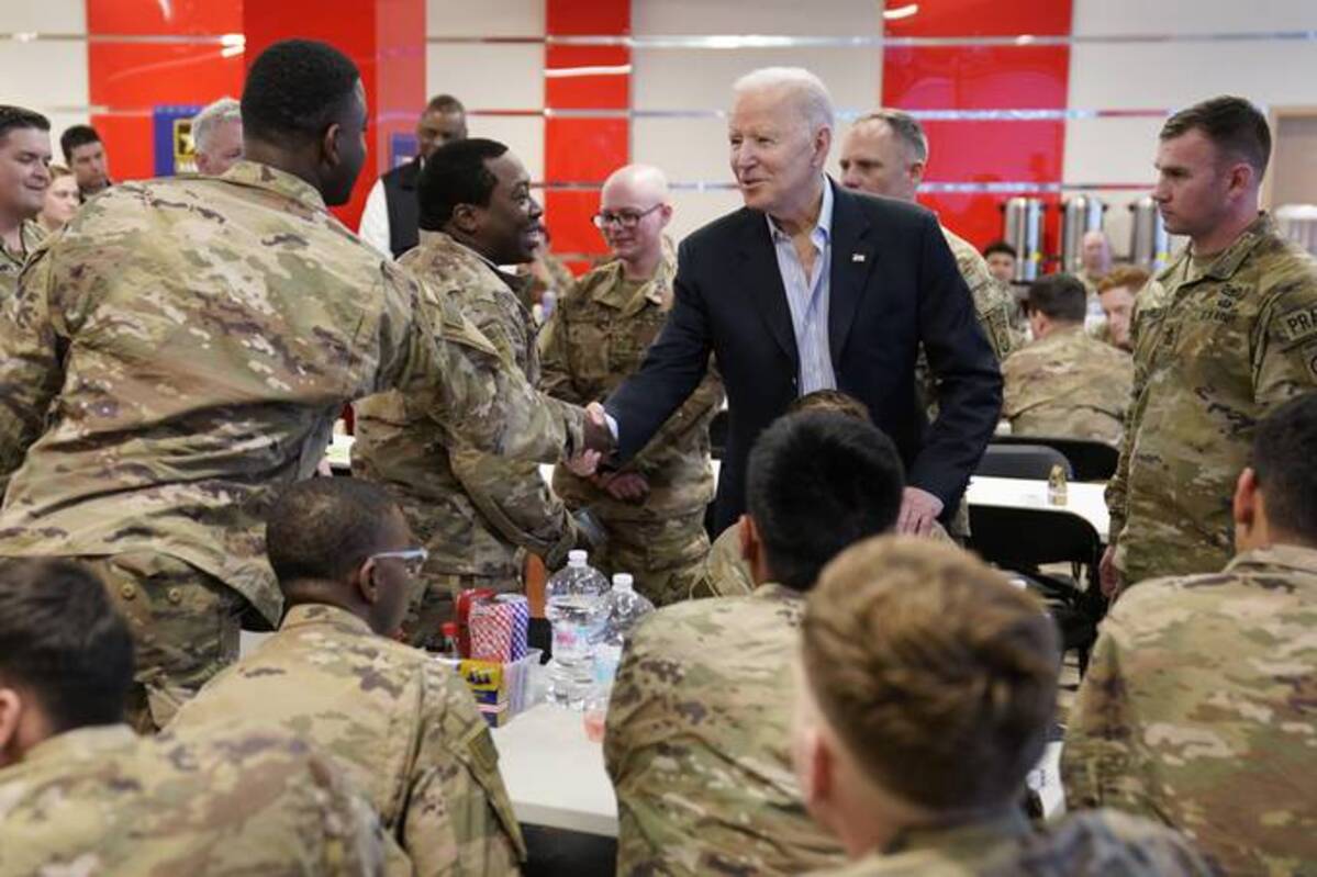 Biden visits with members of the 82nd Airborne Division at the G2A Arena on Friday in Jasionka, Poland. (AP Photo/Evan Vucci)