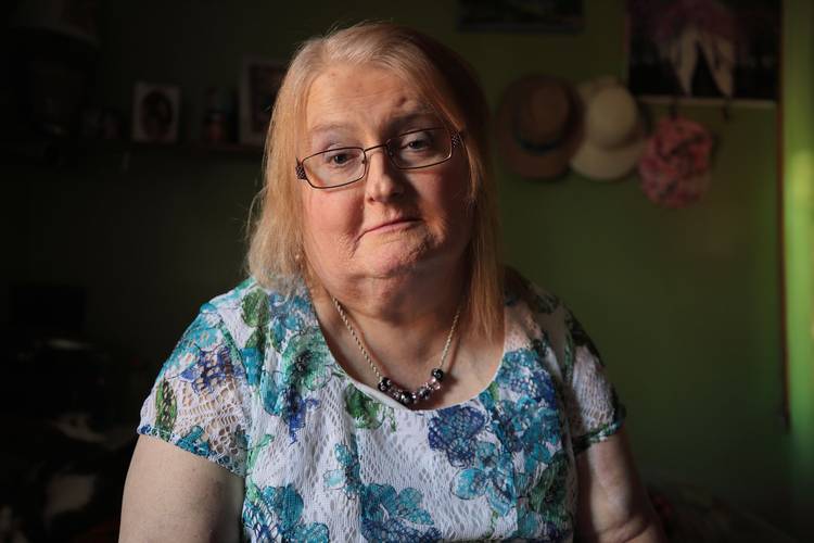 The Supreme Court said it will take up the case of Aimee Stephens, seen at her home in Michigan. Stephens was fired after telling her employer, a funeral home, that she was a transgender woman and would be wearing women's clothing at work. (Charles William Kelly/ACLU/AFP/Getty Images)  