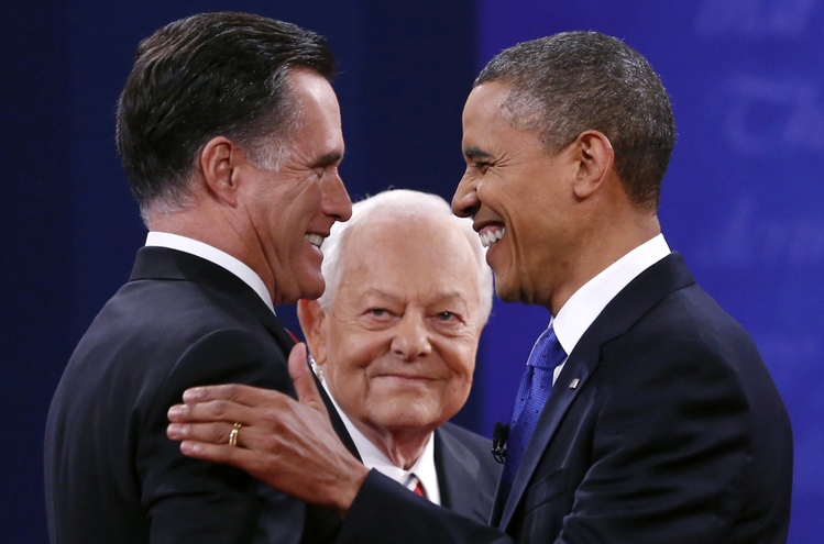 Barack Obama and Mitt Romney at the start of the third 2012 debate in Boca Raton, Florida. At center is moderator Bob Schieffer. (Kevin Lamarque/Reuters)</p>  