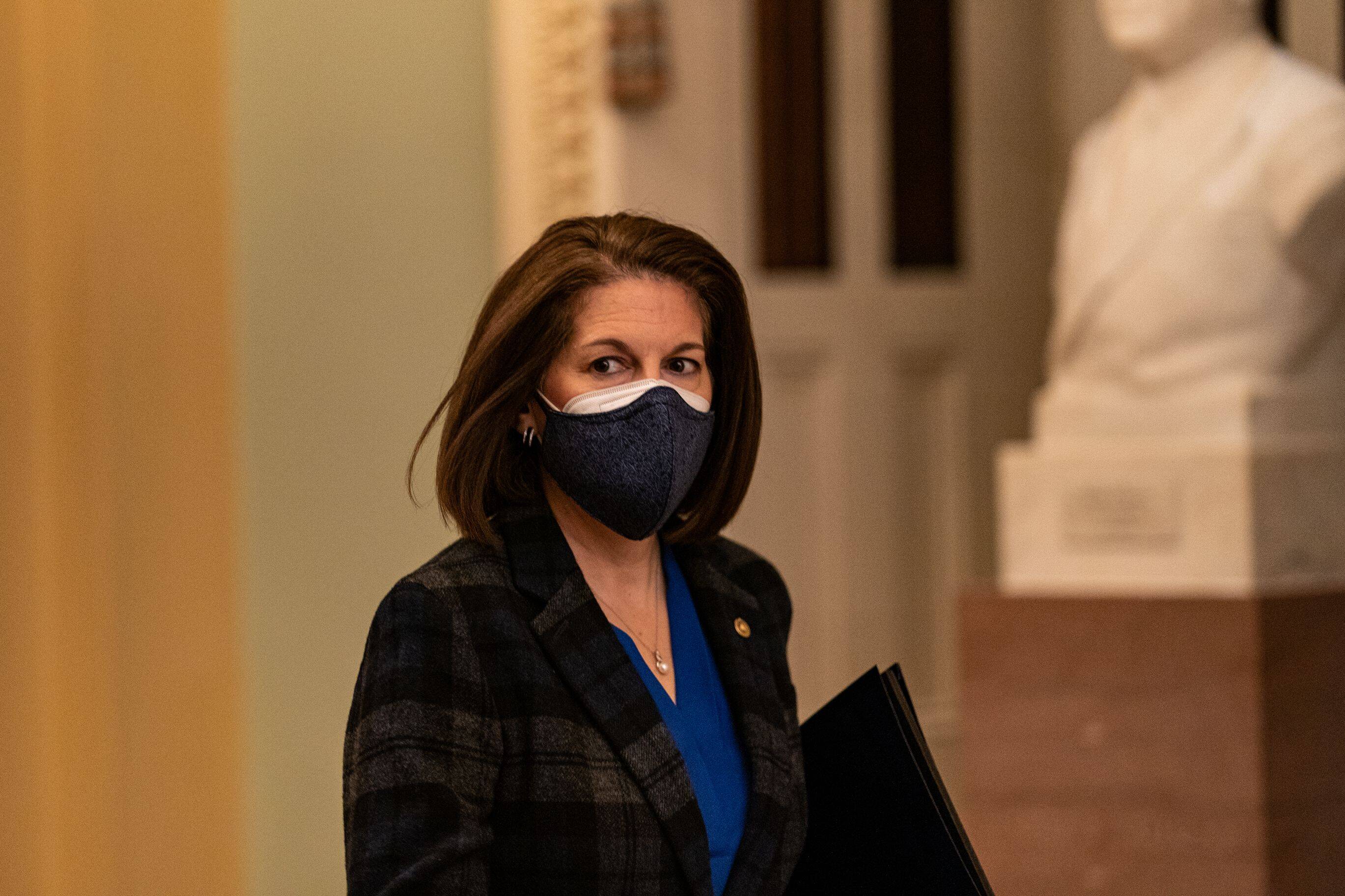 Sen. Catherine Cortez Masto (D-Nev.) makes her way to the Senate floor during the second day of the impeachment trail of former president Donald Trump on Capitol Hill in Washington on Feb. 10, 2021. (Salwan Georges/The Washington Post)