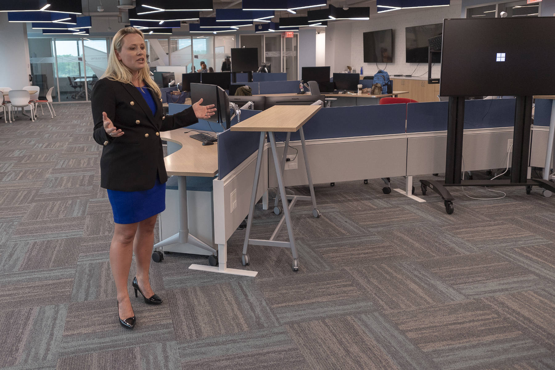 Morgan Adamski, chief of NSA's Cybersecurity Collaboration Center, shows off the new center to media. (NSA)