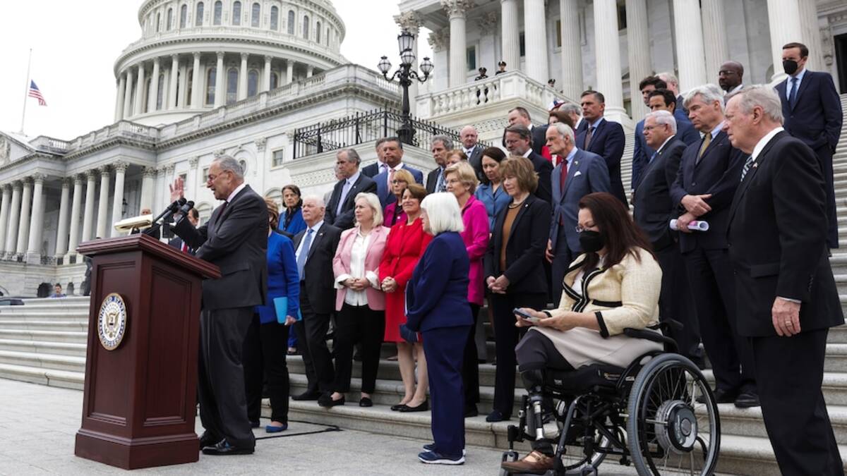 Senate Majority Leader Charles E. Schumer (D-N.Y.), joined by Senate Democrats, addresses reporters on the leaked draft opinion indicating the Supreme Court will overturn Roe v. Wade on Tuesday. (Oliver Contreras/The Washington Post)