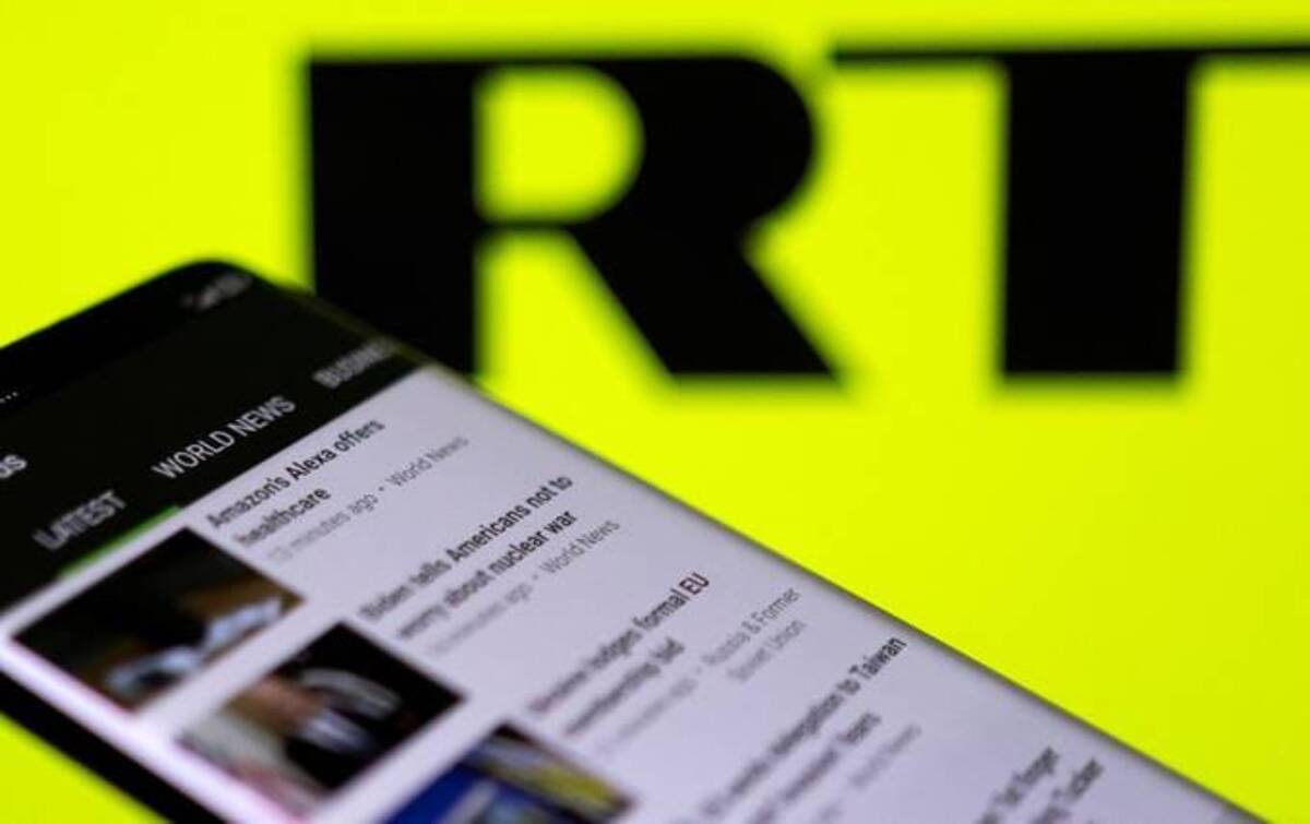 RT has long been criticized for its ties to the Kremlin. (Dado Ruvic/Illustration/Reuters)