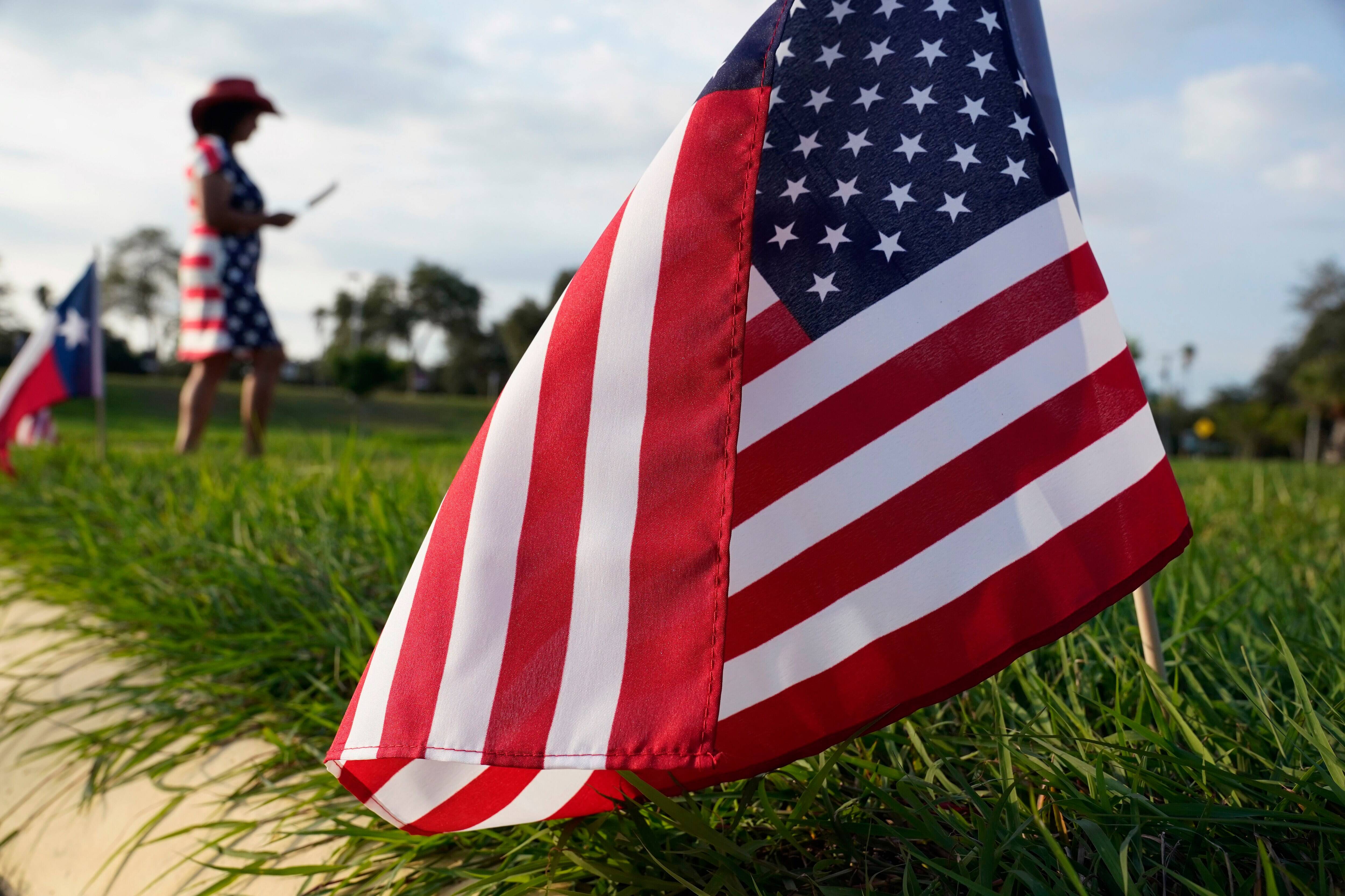 A woman wears an American flag dress as she attends a Cameron County Conservatives event in Brownsville, Tex., on Sept. 22. (Eric Gay/AP)