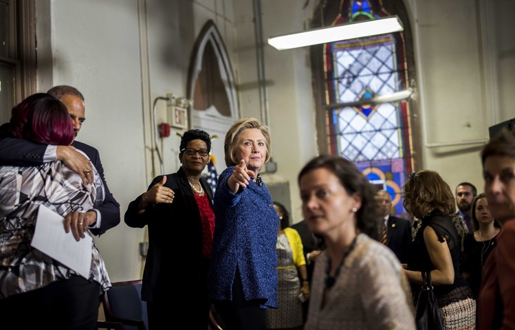 Hillary Clinton campaigns with Eric Holder in Philadelphia last year. (Melina Mara/The Washington Post)</p>  