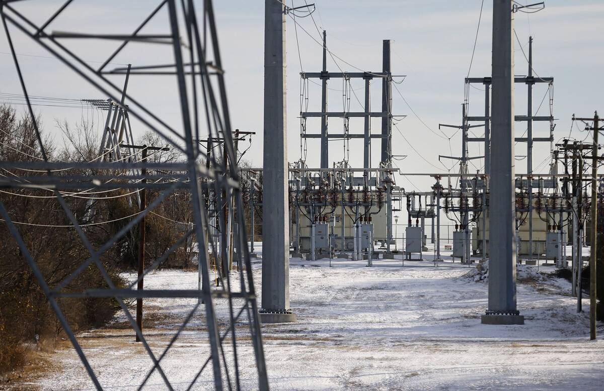 Transmission towers and power lines lead to a substation after a snow storm on Feb. 16, 2021 in Fort Worth, Tex. (Ron Jenkins/Getty)