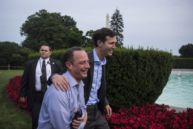 Reince Priebus and Jared Kushner walk together on the South Lawn of the White House. (Jabin Botsford/The Washington Post)  