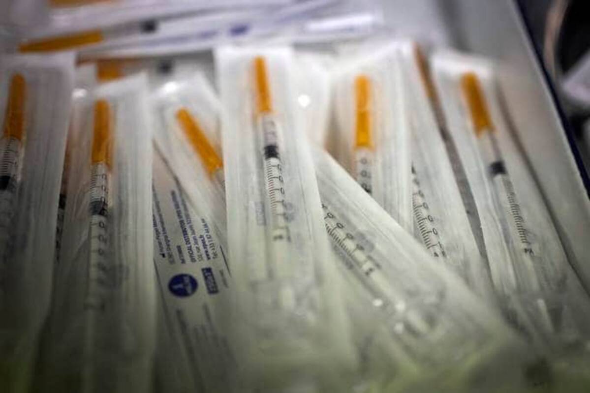 Syringes of Pfizer's coronavirus vaccine are pictured at a vaccination site in Boulogne Billancourt, outside Paris. (Christophe Ena/AP)