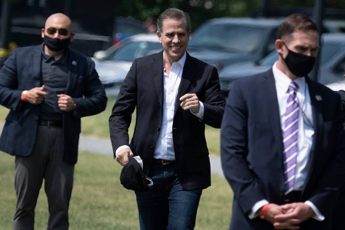 Hunter Biden walks to Marine One on the Ellipse outside the White House on May 22, 2021. (Brendan Smialowski/AFP/Getty Images)