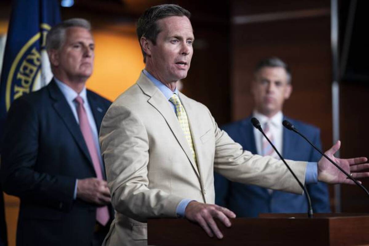 Rep. Rodney Davis (R-Ill.) speaks with House Minority Leader Kevin McCarthy, R-Calif., during a news conference about the Jan. 6 Select Committee on Capitol Hill on July 21. (Photo by Jabin Botsford/The Washington Post)