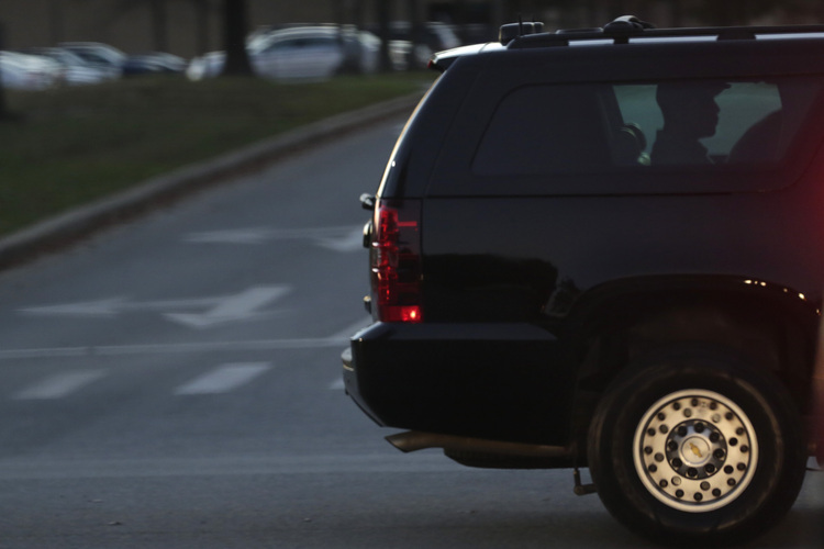 President Obama leaves Joint Base Andrews yesterday after playing golf. (Yuri Gripas/AFP/Getty Images)</p>  