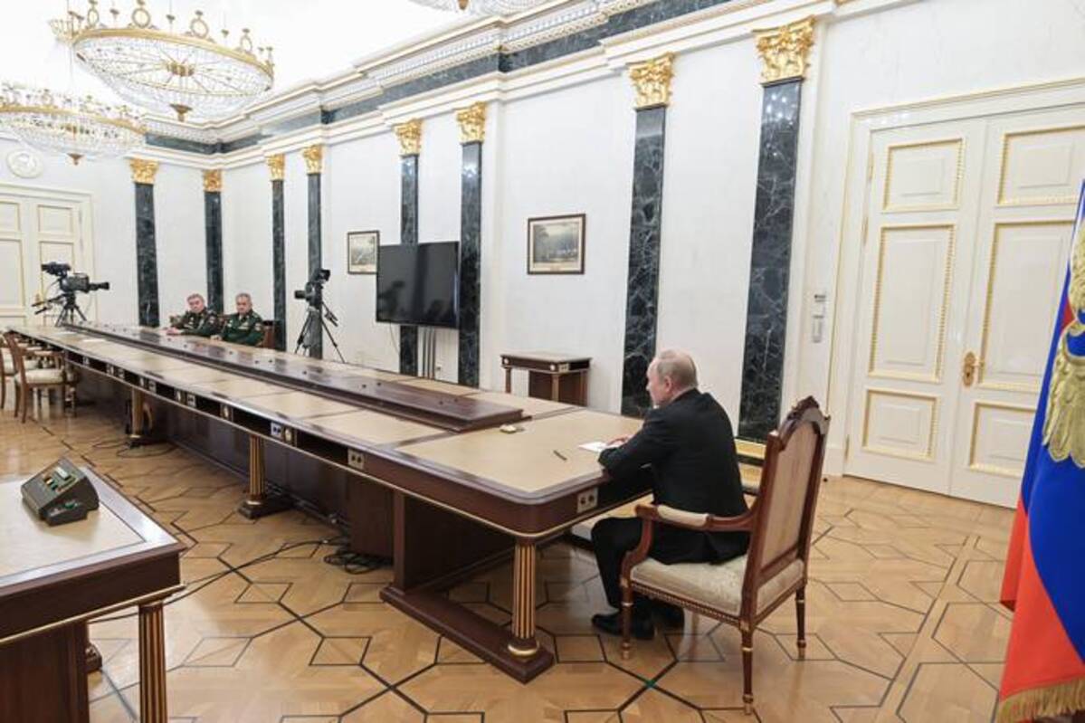 Russian President Vladimir Putin speaks to officials during their meeting in Moscow on Feb. 27. (Alexei Nikolsky/Sputnik, Kremlin Pool Photo via AP)