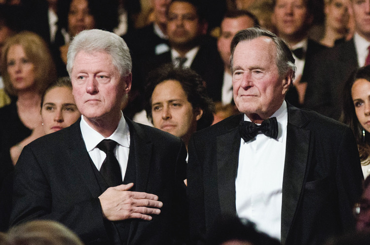 George H.W. Bush&nbsp;and Bill Clinton at a Kennedy Center event a few years ago. (Kris Connor/Getty)</p>  