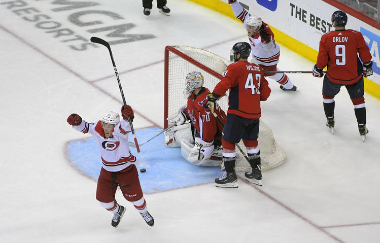 Carolina Hurricanes left wing Brock McGinn celebrates his game-winning goal last night. (John McDonnell/The Washington Post)  