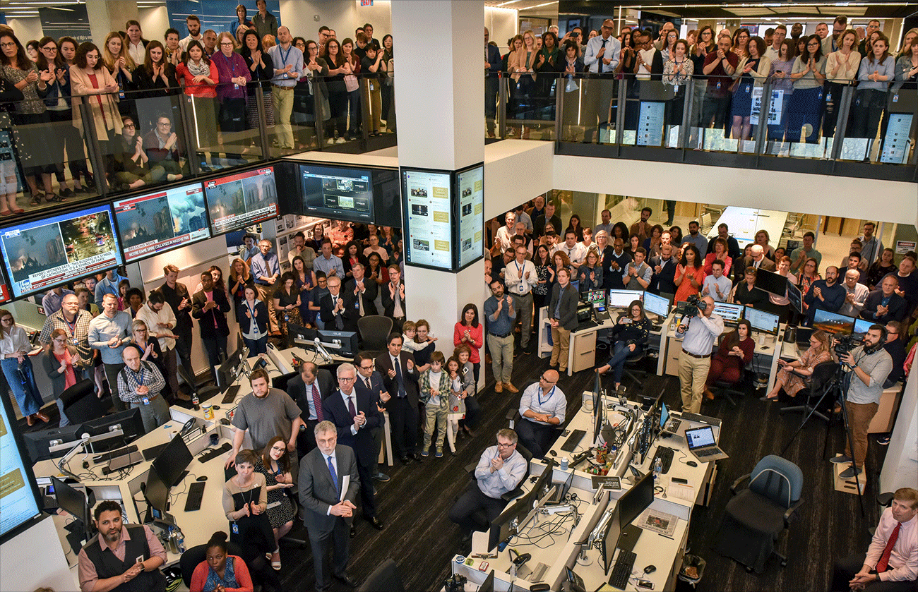 Reporters and editors watch news of the Pulitzer prizes in the newsroom of the Washington Post, on April, 15, 2019 in Washington, D.C.(Photo by Bill O&#39;Leary/The Washington Post)